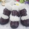 brown and white fur lined dog boots